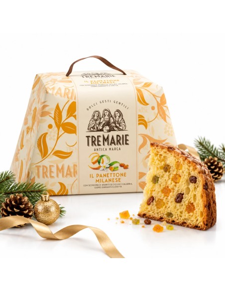 Tre Marie Il Panettone Milanese with a slice of panettone and Christmas decorations